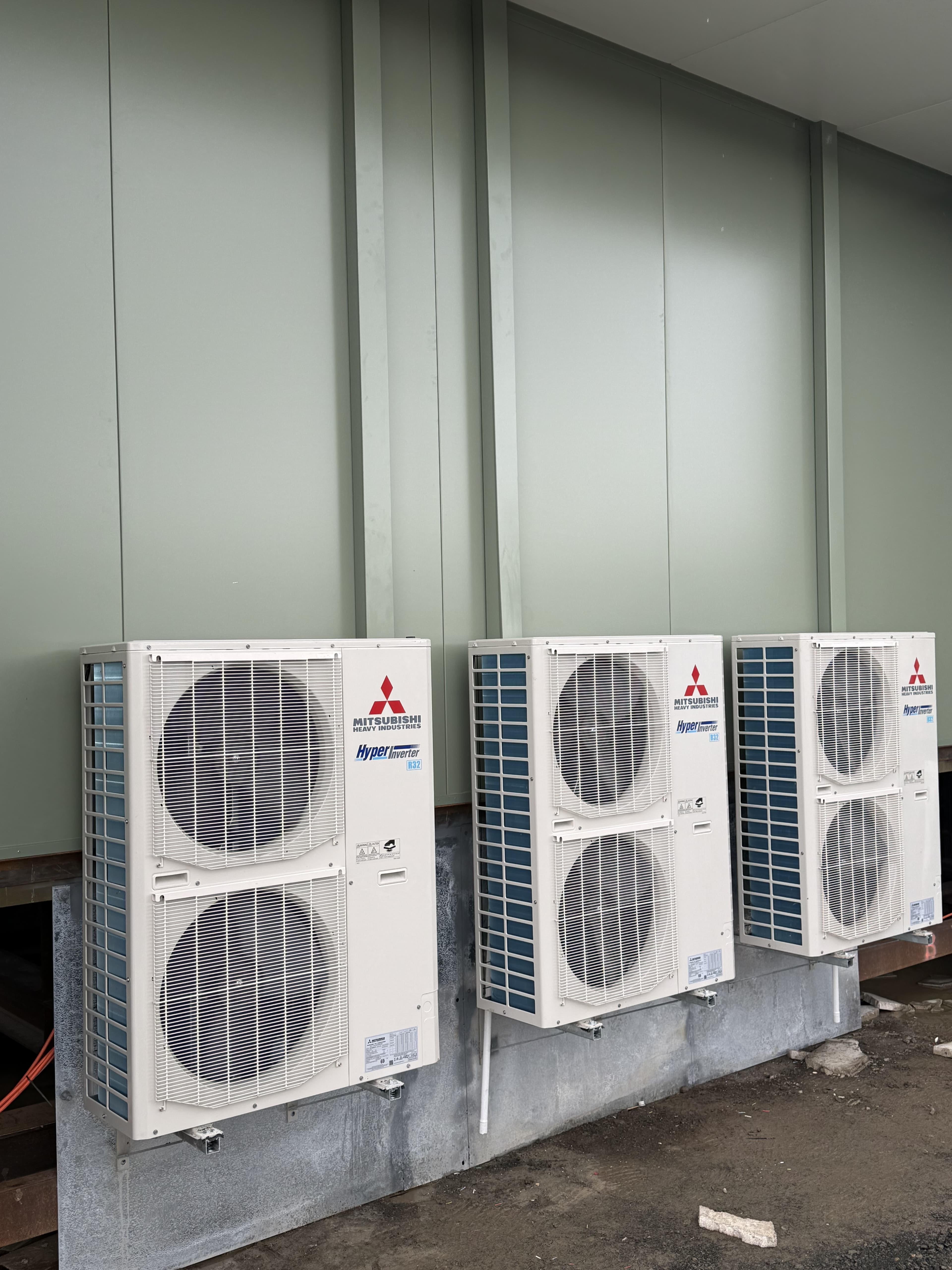 Mitsubishi Heavy Industries outdoor air conditioning units installed on building exterior